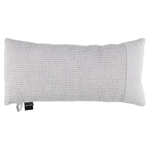 Textured rectangular pillow with a brand label on a white background